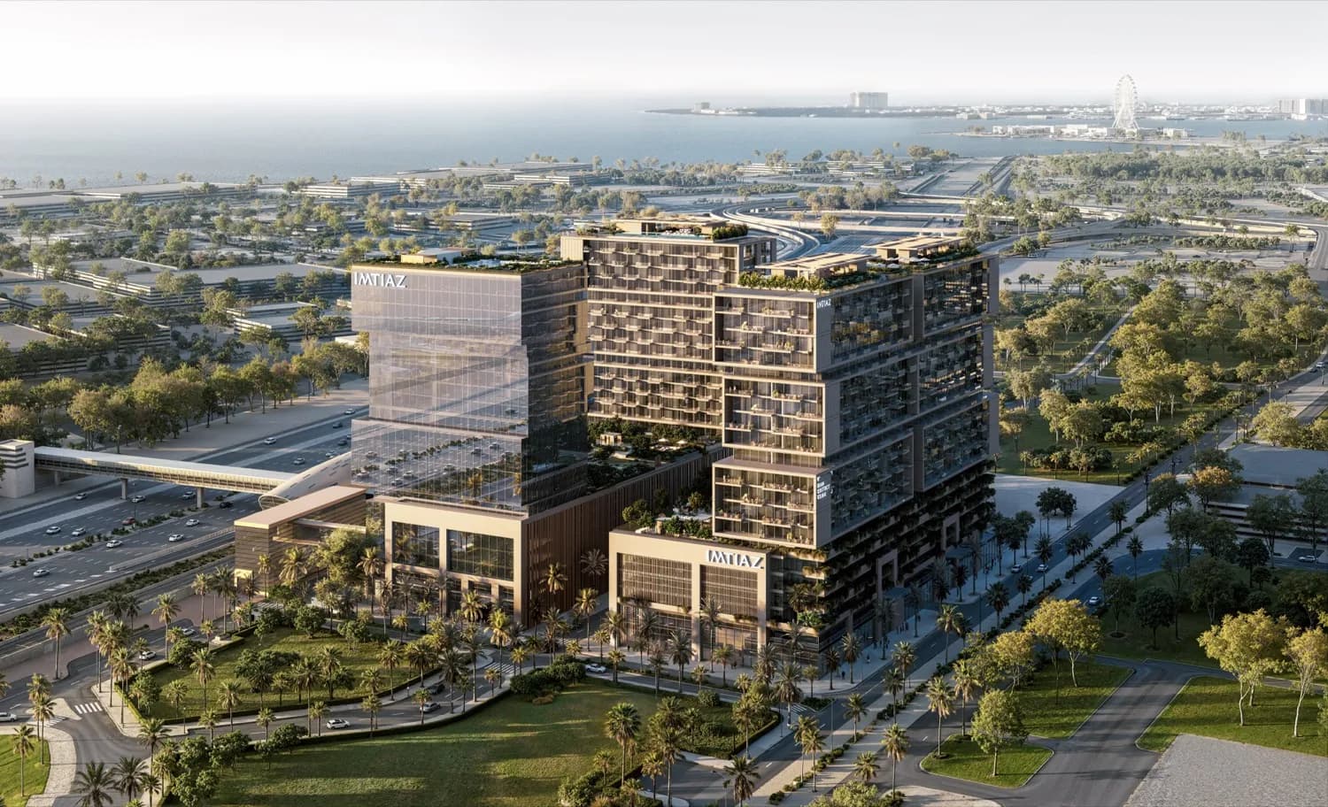 RAW District by Imtiaz — aerial render of the mixed-use district against the Gulf